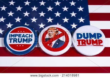 LONDON UK - NOVEMBER 15TH 2017: Anti-Tump badges over an American flag background on 15th November 2017.