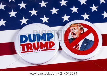 LONDON UK - NOVEMBER 15TH 2017: Anti-Tump badges over an American flag background on 15th November 2017.