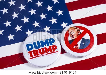 LONDON UK - NOVEMBER 15TH 2017: Anti-Tump badges over an American flag background on 15th November 2017.