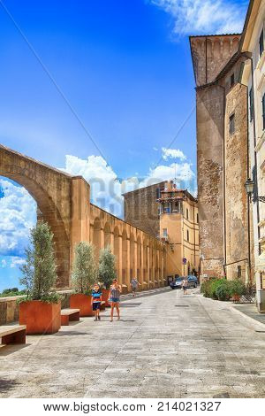 PITIGLIANO, ITALY - JULY 26, 2017: The historic center of gorgeous etruscan and medieval town Pitigliano built of tuff stone, Grosseto, Tuscany, Italy. Called 