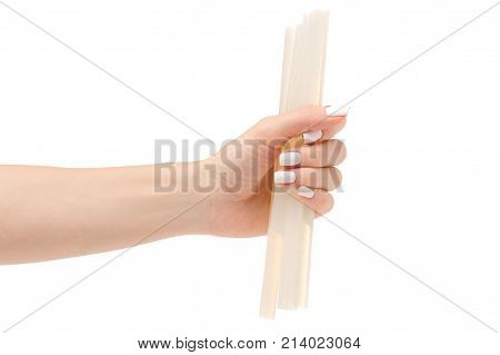 Stem for glue gun in hand on white background isolation