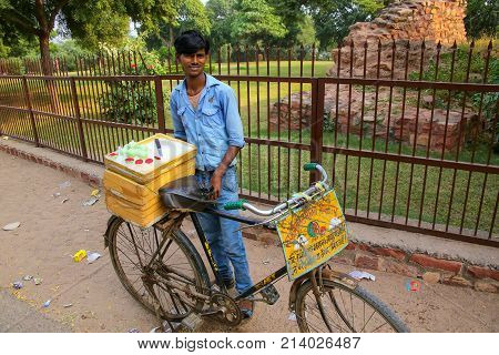 Fatehpur Sikri, India-november 9: Unidentified Man Sells Desserts From A Bicycle Outside Jama Masjid