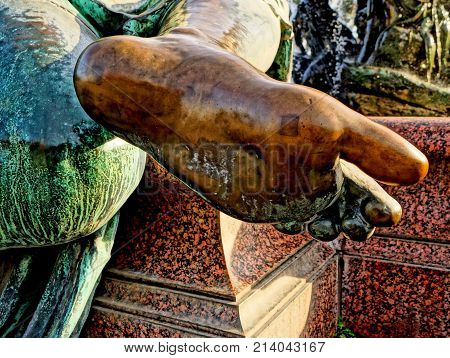 giant copper foot with a small square