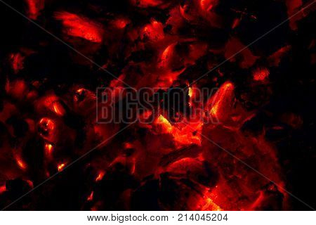 background from the burning of coal . Photo of an abstract texture