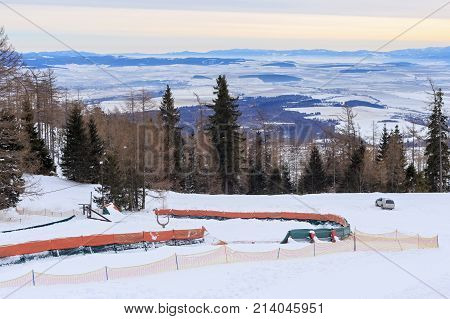 View of a blue plateau from a ski and hiking Hrebienok resort (altitude 1285 m.) located in the High Tatras mountains National park. Slovakia.