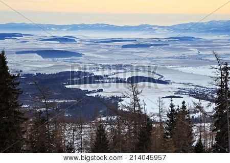 View of a blue plateau from a ski and hiking Hrebienok resort (altitude 1285 m.) located in the High Tatras mountains National park. Slovakia.