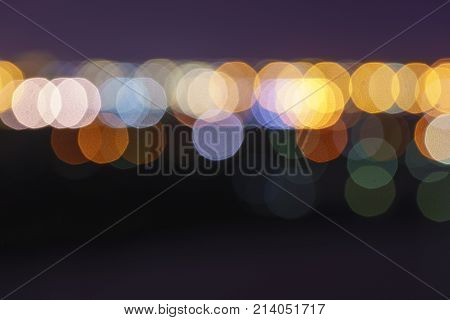 Defocused lights abstract colorful nonagon bokeh background