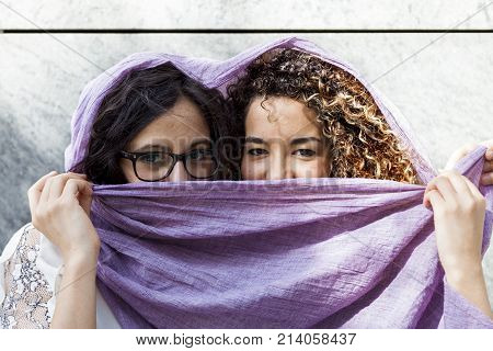 Couple Of Pretty Young Woman In The Center Of A Capital City