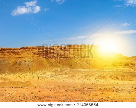 Desert background. Beautiful landscape of spectacular gorge of Colored Canyon, near Mount Sinai and Nuweiba, Sinai Peninsula in Egypt. Sunset light with copy space.