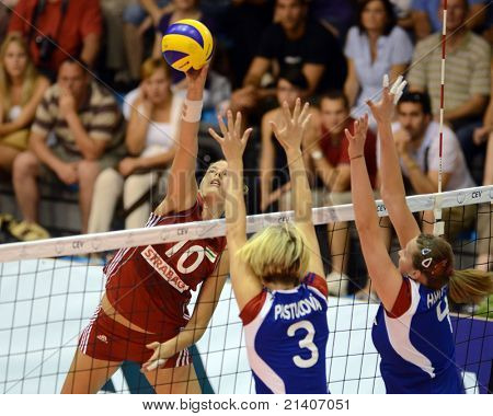 BUDAPEST, HUNGARY - JUNE 17: Dora Horvath (in red 10) in action at a CEV European League woman's volleyball game Hungary vs Czech Republic on June 17, 2011 in Budapest, Hungary.