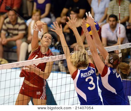 BUDAPEST, HUNGARY - JUNE 17: Dora Horvath (in red 10) in action at a CEV European League woman's volleyball game Hungary vs Czech Republic on June 17, 2011 in Budapest, Hungary.