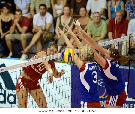 BUDAPEST, HUNGARY - JUNE 17: Dora Horvath (in red 10) in action at a CEV European League woman's volleyball game Hungary vs Czech Republic on June 17, 2011 in Budapest, Hungary.