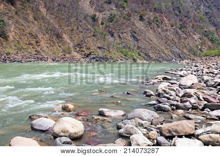 View on the river Ganges near Laxman Jhula in India