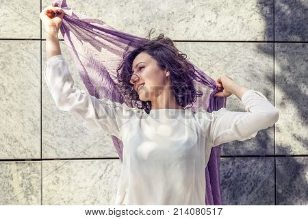 Portrait Of Young Woman In The Center Of A Capital City