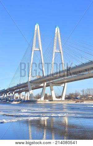 Cable stayed bridge on the outskirts of St. Petersburg at sunny winter day Russia.