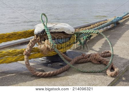 Anchored. Details of pier in a big port