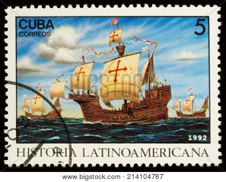 Moscow Russia - November 16 2017: A stamp printed in Cuba shows three ships of Christopher Columbus expedition stopping at Canary Islands series 