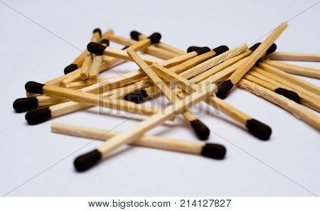 Group of matches in color on white background