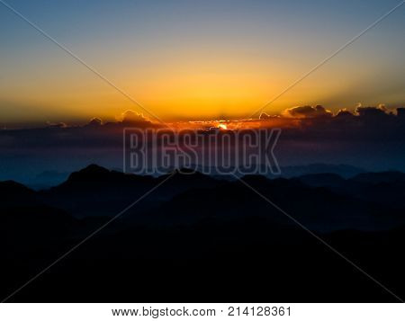 Holy summit of Mount Sinai aerial view, Aka Jebel Musa, 2285 meters, at sunrise, Sinai Peninsula in Egypt. Copy space. Sunrise background.