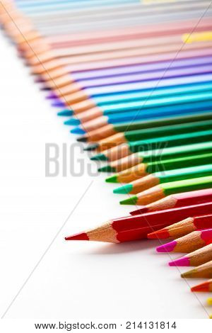 Leadership Concept With One Pencil Standing Out Of Crowd Of Other Pencils