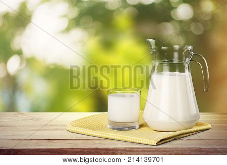 Glass milk jug white background fresh liquid