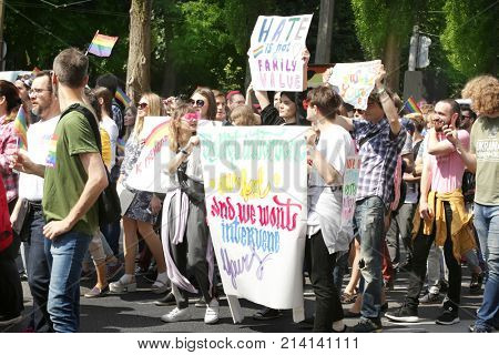 KYIV, UKRAINE - JUNE 18, 2017: Activists holding agitative posters on gay pride