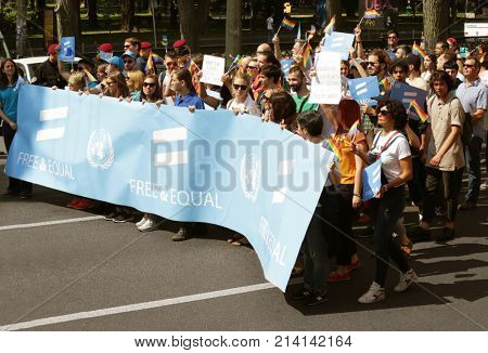 KYIV, UKRAINE - JUNE 18, 2017: Activists holding agitative poster on gay pride