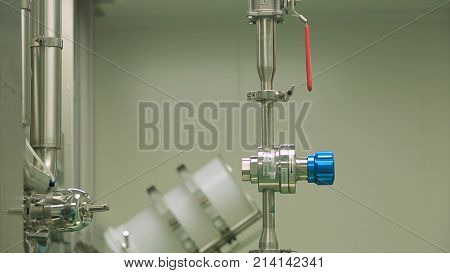 Pharmaceutical technology equipment facility for water preparation, cleaning and treatment at pharmacy plant. pharmaceutical factory equipment mixing tank on production line in pharmacy industry manufacture factory