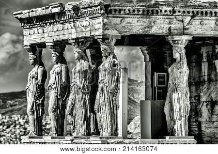 Close-up in black and white for the Acropolis caryatids of Athens
