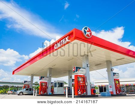 Trang Thailand - September 2 2017: Caltex gas station blue sky background. Caltex is a petroleum brand name of Chevron Corporation used in more than 60 countries.