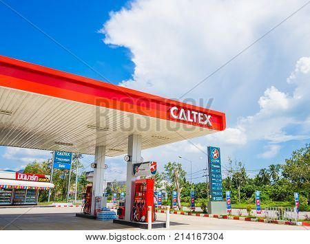 Trang Thailand - September 2 2017: Caltex gas station blue sky background. Caltex is a petroleum brand name of Chevron Corporation used in more than 60 countries.