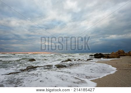 On the shore of the Caspian Sea. Caspian Sea in Kazakhstan.
The Caspian Sea is the largest enclosed inland body of water on Earth by area, variously classed as the world's largest lake or a full-fledged sea.