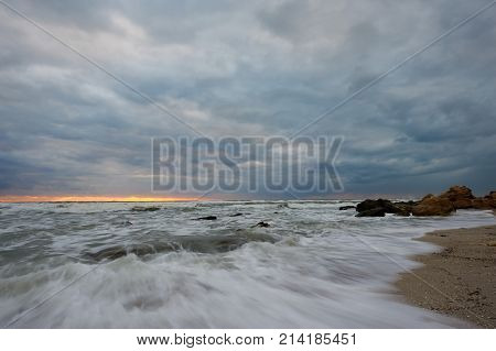 On the shore of the Caspian Sea. Caspian Sea in Kazakhstan.
The Caspian Sea is the largest enclosed inland body of water on Earth by area, variously classed as the world's largest lake or a full-fledged sea.