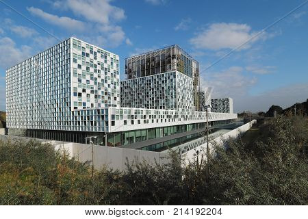 The Hague Netherlands - November 3 2017: The new 2016 opened International Criminal Court building with moat located between dunes in The Hague.