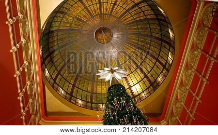Sydney Australia - November 03 2017: Swarovski Crystal Christmas Tree tip and dome of Queen Victoria Building part of Sydney Christmas celebrations.