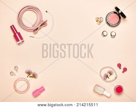 Fashionable Women's Cosmetics and Accessories. Falt Lay. Nail Polish and blush. Jewelry and Rings. Women Accessories