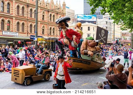 Adelaide Australia - November 18 2017: Parade participants walk along crowd of people during Adelaide's 85th Credit Union Christmas Pageant parade