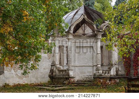 Old abandoned arbor in the autumn park, Konig Palace, Ukraine