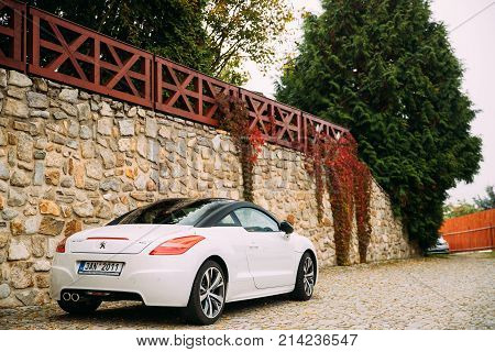 Cesky Krumlov, Czech Republic - September 27, 2017: Back View Of White Peugeot RCZ Car Parked In Street.
