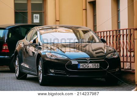 Vilnius, Lithuania - September 29, 2017: Black Color Tesla Model S Car In Motion On Street. The Tesla Model S Is A Full-sized All-electric Five-door, Luxury Liftback, Produced By Tesla Inc.