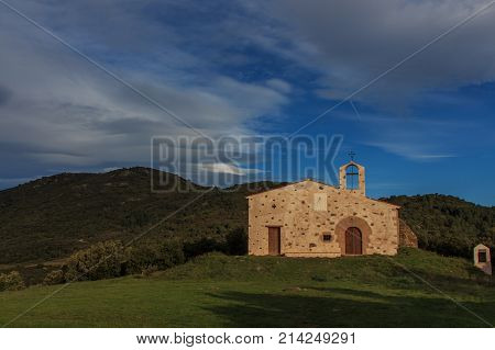Ermita of Sant Elies. The colors of Autumn appear on the mountain, corollarizing it