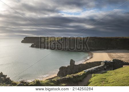 Stunning, Vibrant Sunrise Landscape Image Of Barafundle Bay On Pembrokeshire Coast In Wales
