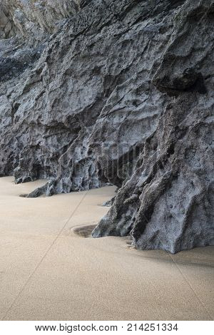 Intimate Landscape Image Of Rocks And Sand On Broadhaven Beach In Pembrokeshire Wales