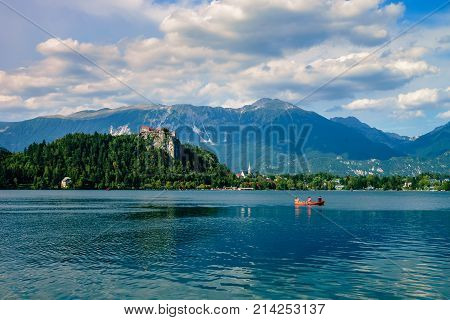 Colorful summer scene on the Bled lake with medieval castle Blejski grad. Slovenia, Europe.