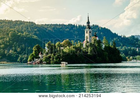 Colorful summer scene on the Bled lake with medieval castle Blejski grad. Slovenia, Europe.
