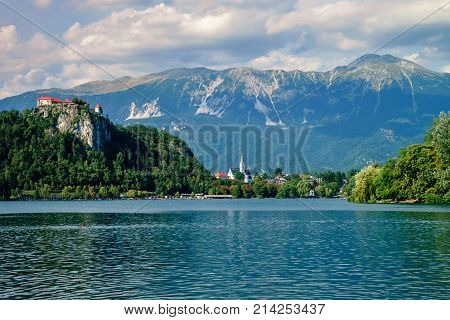 Colorful summer scene on the Bled lake with medieval castle Blejski grad. Slovenia, Europe.