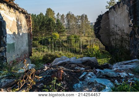 Pile of old rubbish or garbage in ruined house. Illustration of anthropogenic pollution of environment