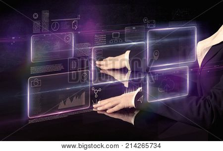 Male hands touching interactive table with purple cloudspace graphic on it 
