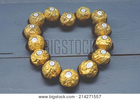 BANGKOK THAILAND - November 15, 2017: A box of Ferrero Rocher Chocolates. Since 1982, the candy consists of a whole roasted hazelnut in a thin wafer shell filled with hazelnut cream coated in milk