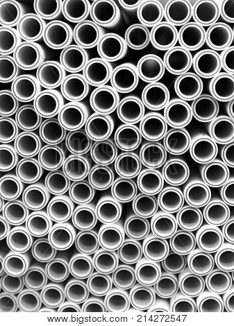 Plactic Plumbing connection fittings for plastic pipes. Orderly arranged in neat rows. Abstract industrial background.